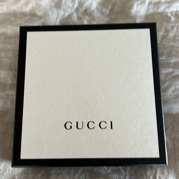 Gucci box paper w/sticker and Gucci ribbon. Authentic.